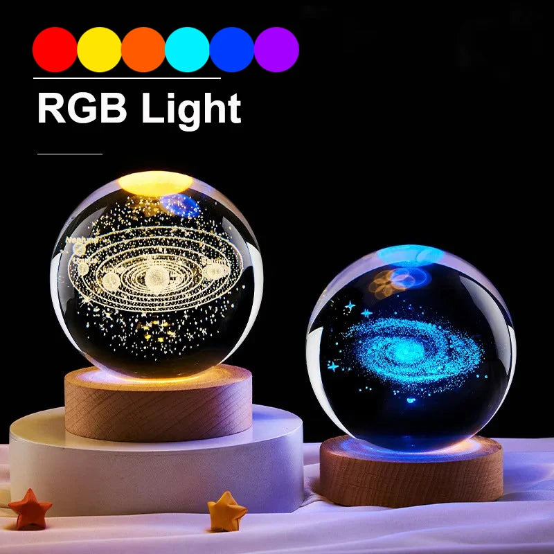Two crystal balls with RGB light display on a dark background